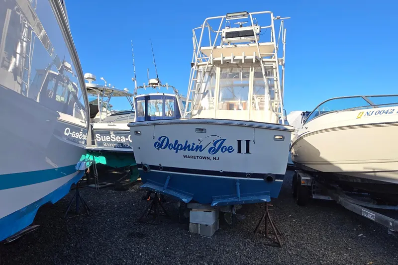 Slide: The Image of 1987 Topaz 29 Sportfisherman "Dolphin Joe II" in boatyard, Wareton, NJ. - 16