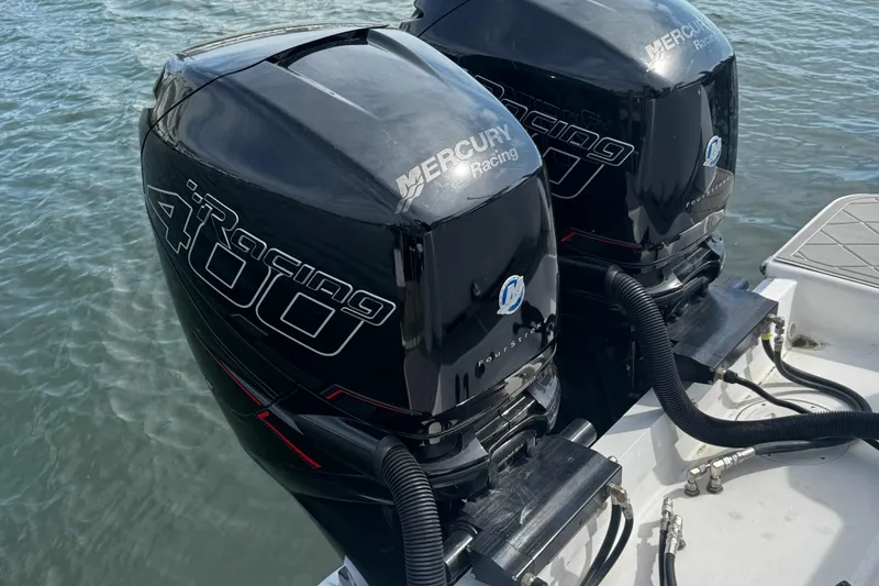 Slide: The Image of Twin Mercury Racing 400 outboard engines on a 2015 Belzona 32 CC boat. - 10
