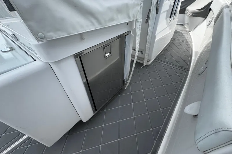 Slide: The Image of 2015 Belzona 32 CC boat interior with sleek design and modern flooring. - 34