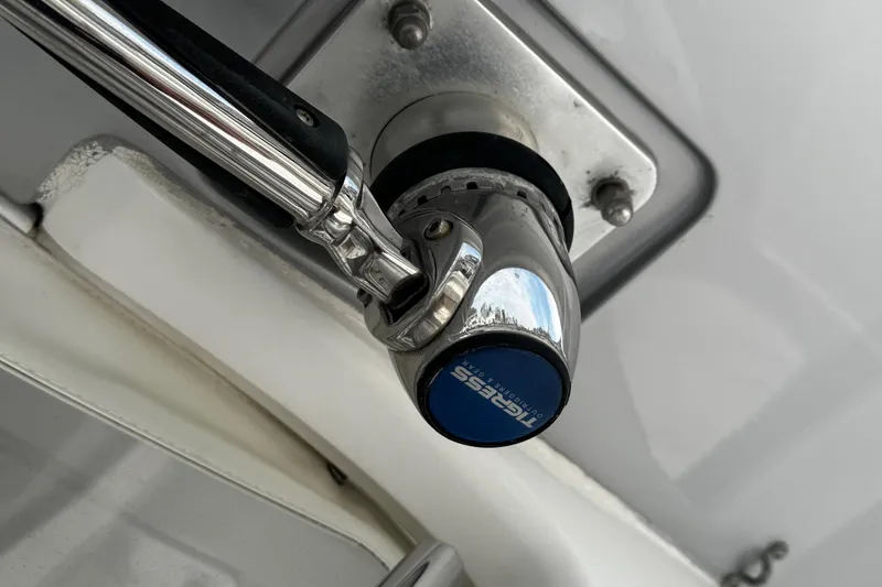 Slide: The Image of Close-up of a Tigress outrigger base on a 2015 Belzona 32 CC boat. - 39