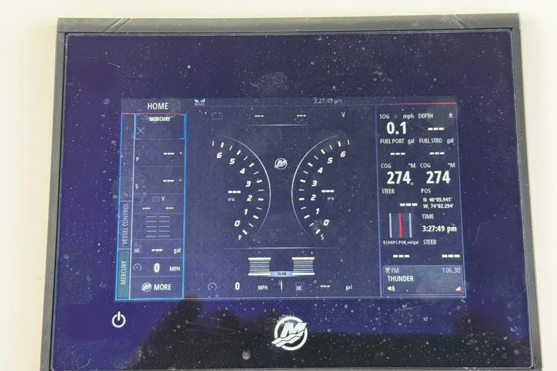 Slide: The Image of Digital dashboard display of a 2015 Belzona 32 CC boat, showing navigation and engine data. - 56