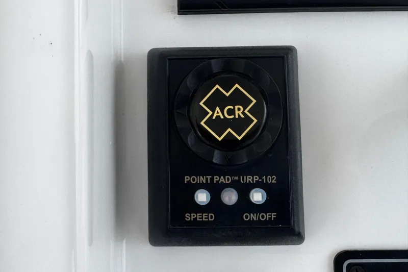 Slide: The Image of ACR Point Pad URP-102 control panel on 2015 Belzona 32 CC boat. - 57