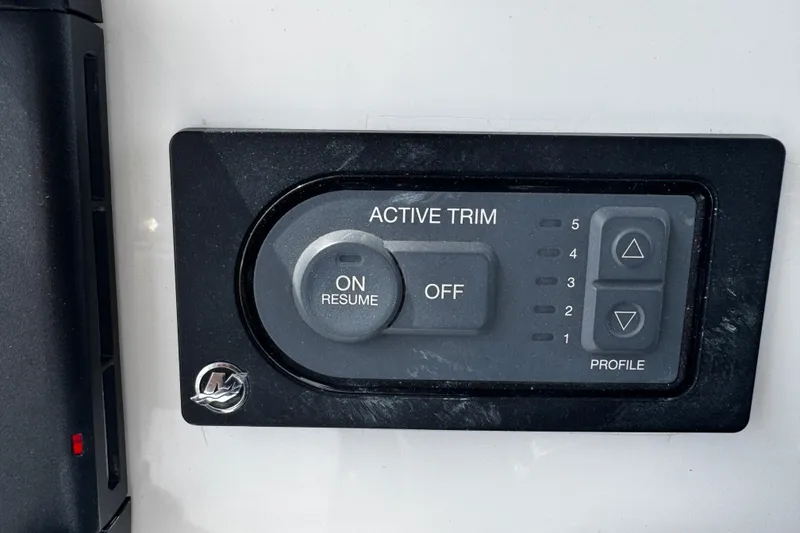 Slide: The Image of Active trim control panel on a 2015 Belzona 32 CC boat. - 60