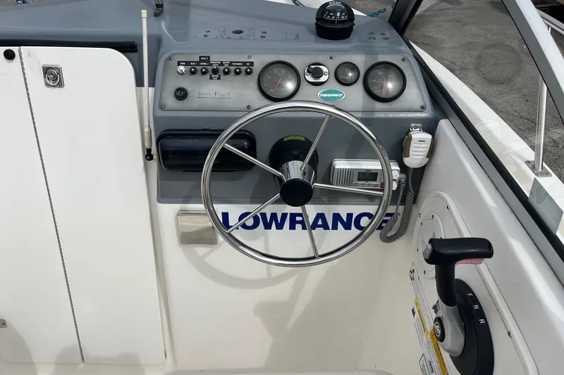 Slide: The Image of Steering console of 2010 Trophy 1802 Walkaround boat with Lowrance equipment. - 9