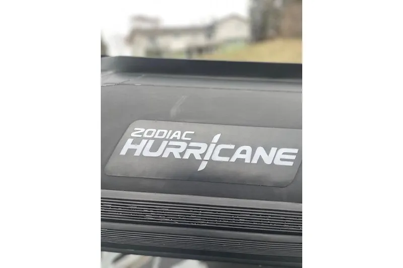 Slide: The Image of Zodiac Hurricane logo on a 1997 inflatable boat, close-up view. - 22