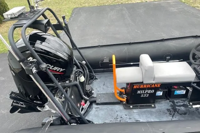 Slide: The Image of Zodiac inflatable boat with Mercury engine, Hurricane Milpro 533 seat, 1997 model. - 6