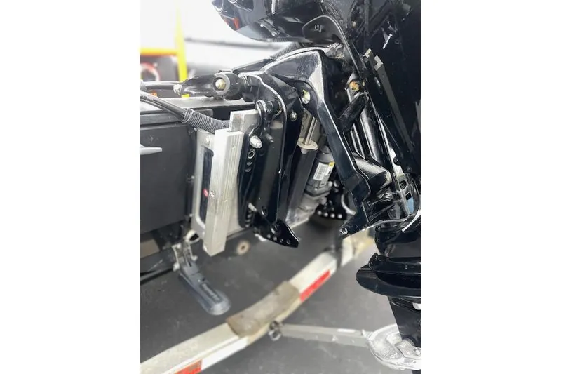 Slide: The Image of Close-up of a Zodiac boat engine component, 1997 model, showing mechanical details. - 7