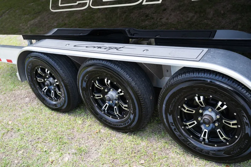 Slide: The Image of 2023 Concept 36 trailer with stylish black wheels. - 10