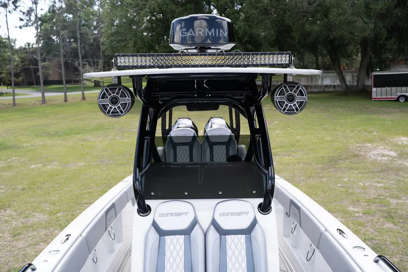 Slide: The Image of 2023 Concept 36 boat with Garmin equipment and modern speakers. - 18