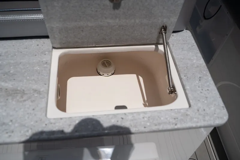 Slide: The Image of Open storage compartment in Concept 36 boat, 2023 model. - 27