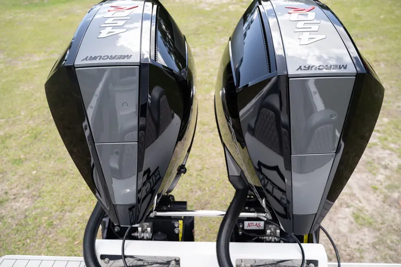 Slide: The Image of Two Mercury 450R outboard engines on a Concept 36 boat, year 2023. - 37