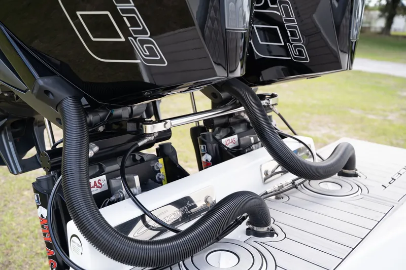 Slide: The Image of 2023 Concept 36 boat engines with hoses and controls. - 8