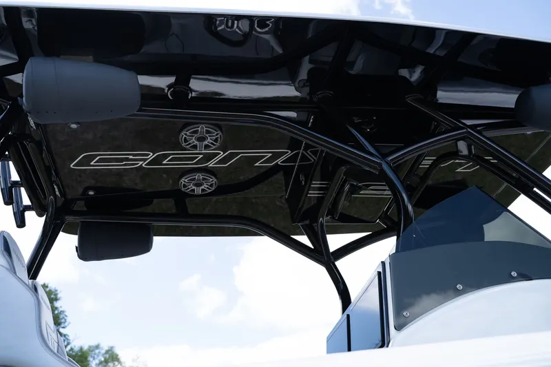 Slide: The Image of 2023 Concept 36 boat with black roof and speakers. - 9