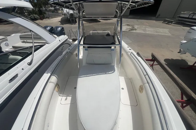 Slide: The Image of 2007 Century 2400 Center Console boat with spacious deck and seating area. - 17