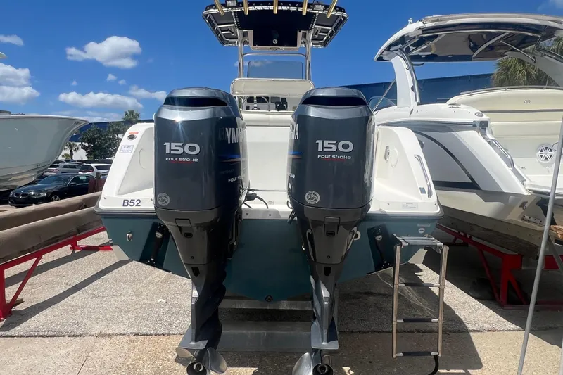 Slide: The Image of 2007 Century 2400 Center Console boat with twin Yamaha 150 four-stroke engines. - 3