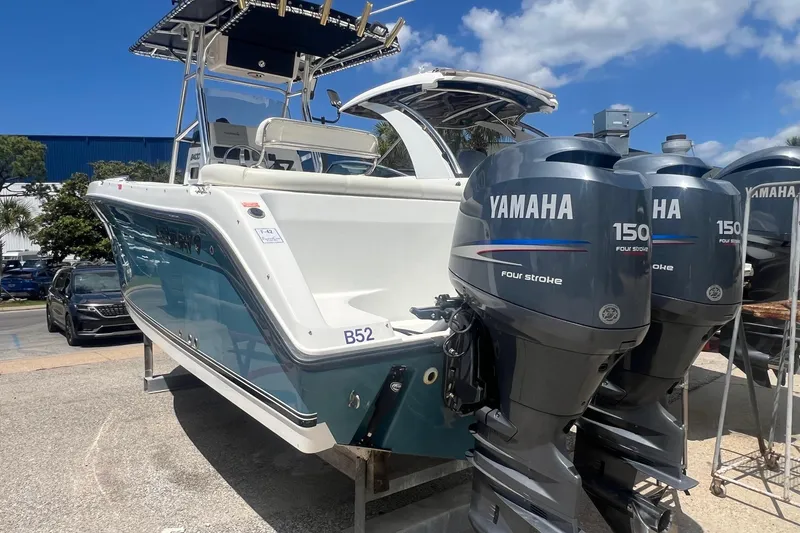 Slide: The Image of 2007 Century 2400 Center Console boat with twin Yamaha 150 four-stroke engines. - 5