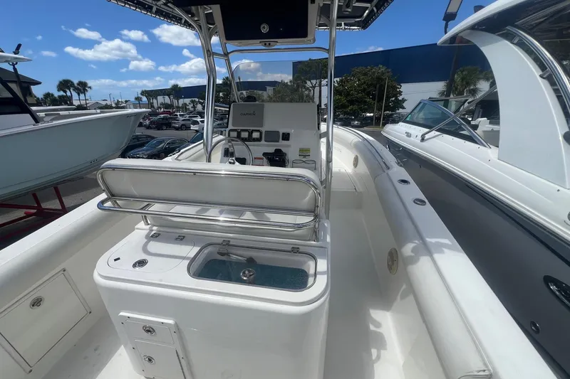 Slide: The Image of 2007 Century 2400 Center Console boat with sleek design, spacious deck, and modern controls. - 9