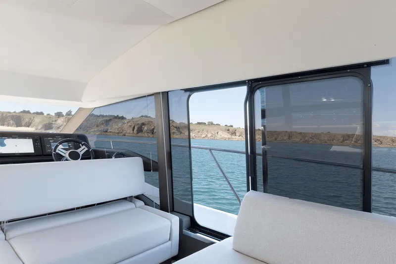Slide: The Image of Manufacturer Provided Image: Luxurious interior of 2024 Prestige 520 yacht with scenic ocean view. - 25