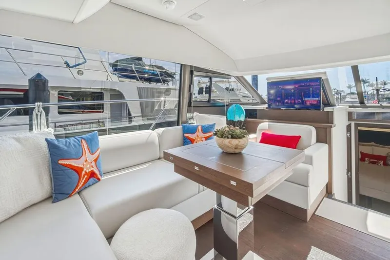 Slide: The Image of Luxurious interior of 2024 Prestige 520 yacht with modern seating and nautical decor. - 27