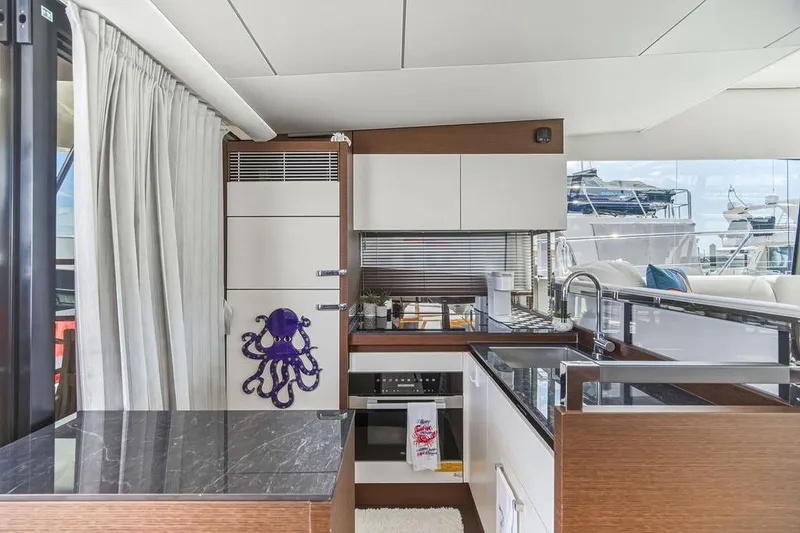 Slide: The Image of Luxurious 2024 Prestige 520 yacht kitchen with modern design and elegant finishes. - 29