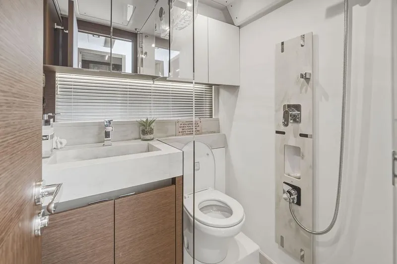Slide: The Image of Modern bathroom in 2024 Prestige 520 yacht with sleek fixtures and elegant design. - 35