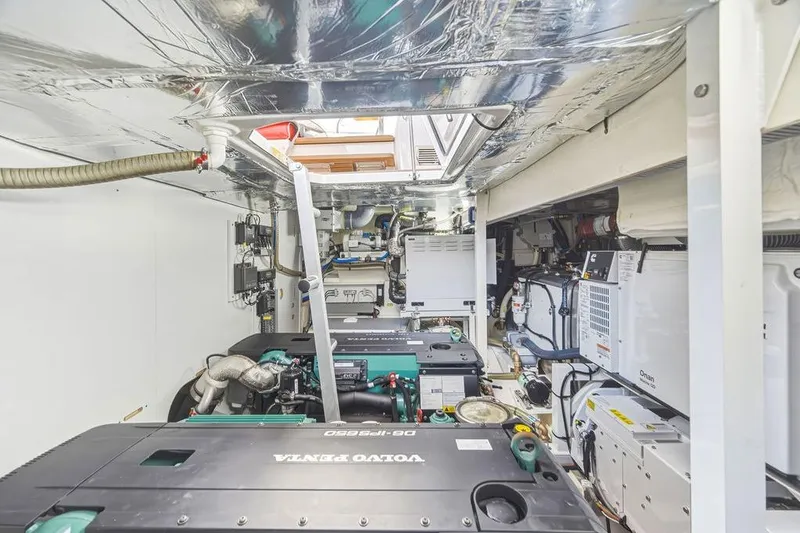 Slide: The Image of Engine room of 2024 Prestige 520 yacht with Volvo Penta engines and advanced equipment. - 42