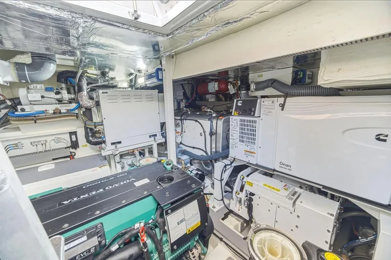 Slide: The Image of Engine room of 2024 Prestige 520 yacht, featuring advanced machinery and equipment. - 45