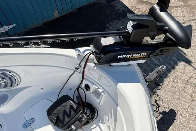 Slide: The Image of Minn Kota trolling motor on 2018 Tahoe 500 TF boat deck, outdoor setting. - 10