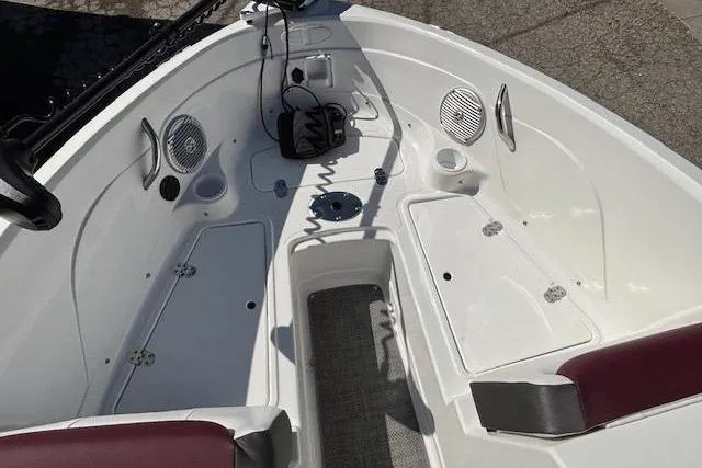 Slide: The Image of Interior view of a 2018 Tahoe 500 TF boat, featuring seating and speakers. - 11