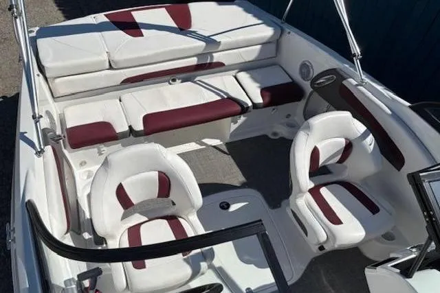 Slide: The Image of 2018 Tahoe 500 TF boat interior with white and maroon seating arrangement. - 15