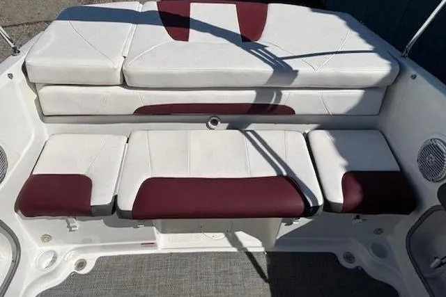 Slide: The Image of White and maroon seating on 2018 Tahoe 500 TF boat, featuring cushioned design. - 24
