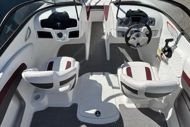 Slide: The Image of Interior of a 2018 Tahoe 500 TF boat with modern dashboard and seating. - 25