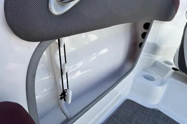 Slide: The Image of Interior view of a 2018 Tahoe 500 TF boat, featuring seating and storage area. - 28