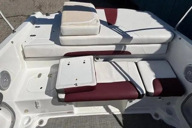 Slide: The Image of 2018 Tahoe 500 TF boat interior with white and maroon seating arrangement. - 29