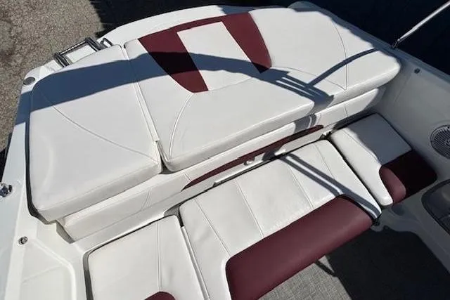Slide: The Image of 2018 Tahoe 500 TF boat interior with white and maroon seating. - 33