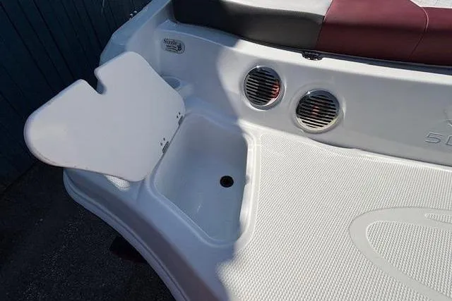 Slide: The Image of 2018 Tahoe 500 TF boat deck with storage compartment and speakers. - 36
