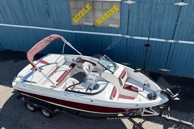 Slide: The Image of 2018 Tahoe 500 TF boat with red and white interior, parked at Sizzle Marine, Ohio. - 7