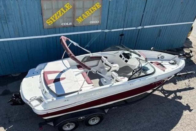 Slide: The Image of 2018 Tahoe 500 TF boat with red and white design, parked at Sizzle Marine, Ohio. - 8
