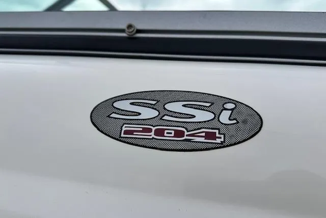 Slide: The Image of 2007 Chaparral 204 SSi boat emblem on white surface. - 21