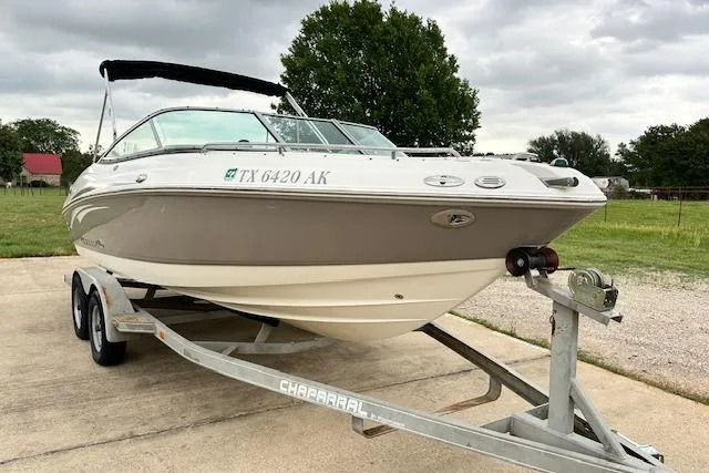 Slide: The Image of 2007 Chaparral 204 SSi boat on trailer, parked outdoors on a cloudy day. - 3