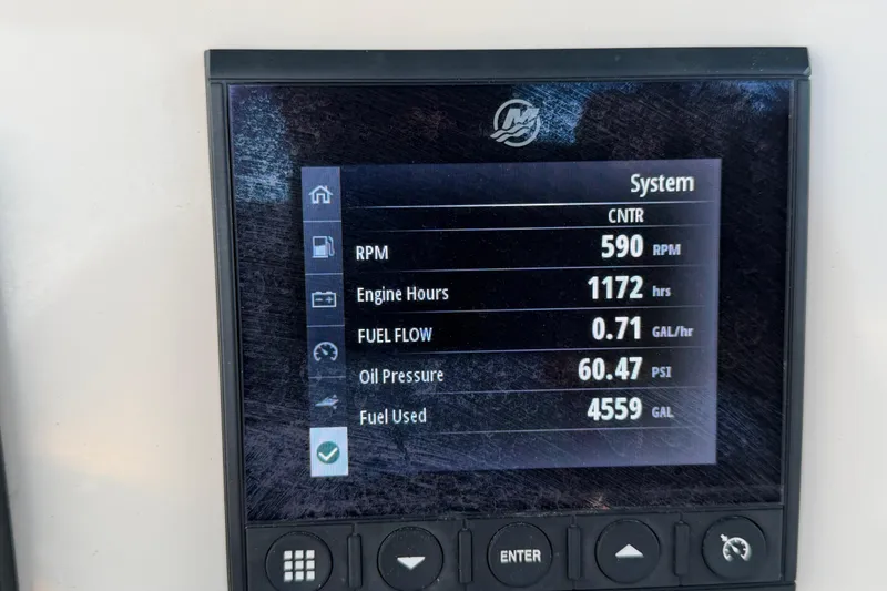 Slide: The Image of Display screen showing engine metrics for 2023 Boston Whaler 220 Dauntless boat. - 42