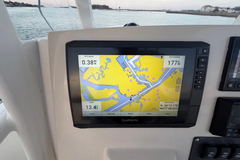 Slide: The Image of Garmin GPS display on 2023 Boston Whaler 220 Dauntless, showing navigation map and data. - 51