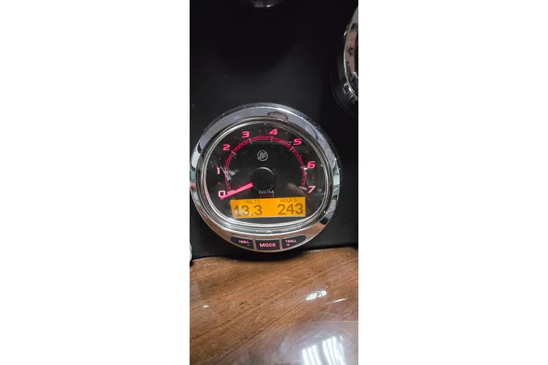 Slide: The Image of Gauge display on 2018 Four Winns V355 boat showing 13.3 volts and 243 hours. - 10