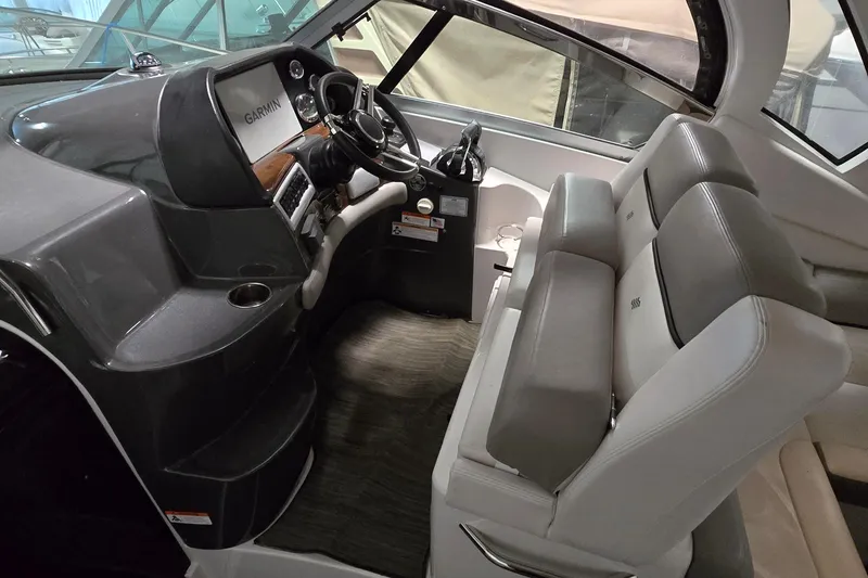 Slide: The Image of Interior cockpit of 2018 Four Winns V355 boat with Garmin navigation system. - 15