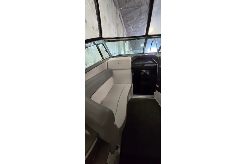Slide: The Image of Interior view of 2018 Four Winns V355 boat, featuring comfortable seating and sleek design. - 20