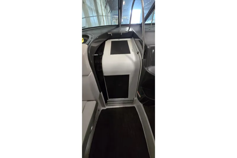 Slide: The Image of Interior view of 2018 Four Winns V355 boat cabin entrance with sleek design. - 24