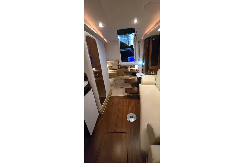 Slide: The Image of Interior of 2018 Four Winns V355 yacht with elegant seating and modern design. - 30