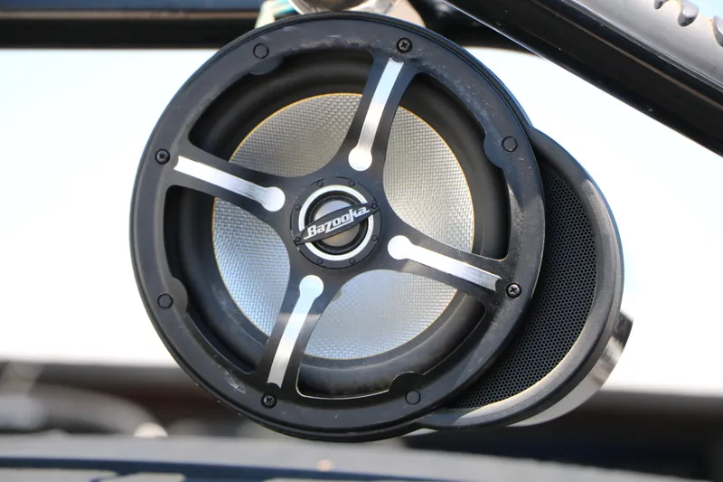 Slide: The Image of Bazooka marine speaker on a 2004 Rinker 212 Captiva Bowrider boat. - 28
