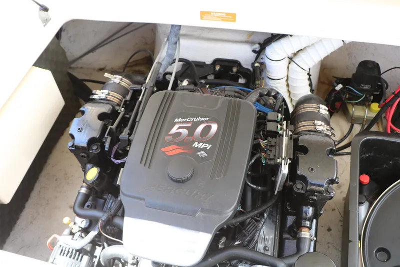 Slide: The Image of 2004 Rinker 212 Captiva Bowrider engine compartment with MerCruiser 5.0 MPI engine. - 41