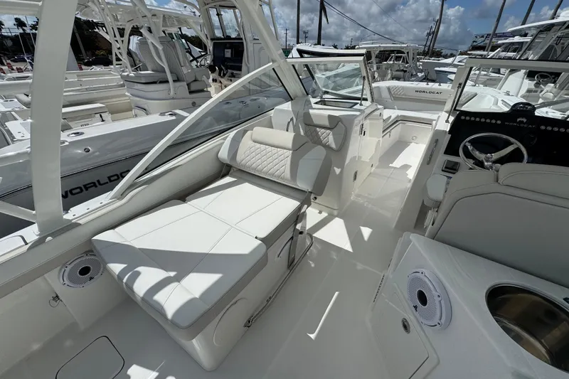Slide: The Image of 2026 World Cat 280 DC-X boat interior with luxurious seating and modern design. - 11
